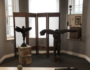 Installation in response to Elaine Ling photographs using sculpture by Adrian Symonds and other found objects placed by d harris