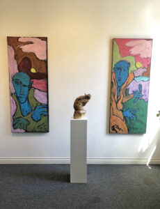 Paintings by E.J. Gold Sculpture by Floyd Kuptana